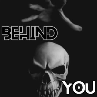 Behind you