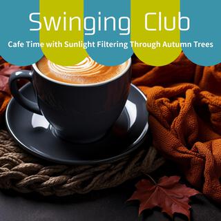 Cafe Time with Sunlight Filtering Through Autumn Trees