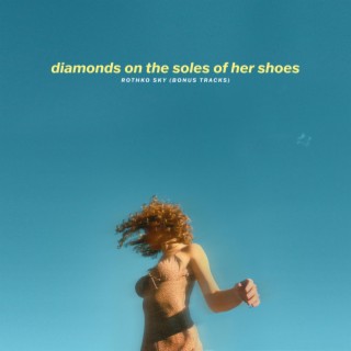 diamonds on the soles of her shoes