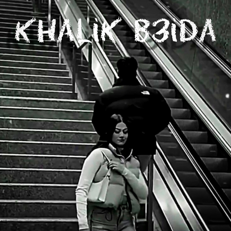 Khalik b3ida ft. NADI | Boomplay Music