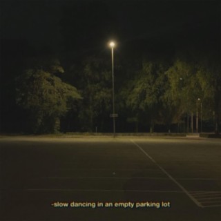 slow dancing in an empty parking lot