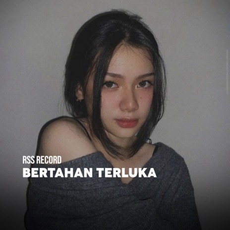 Bertahan Terluka | Boomplay Music