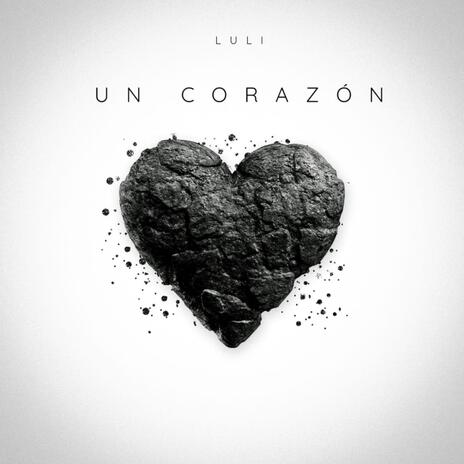 Un corazón ft. Arielo | Boomplay Music