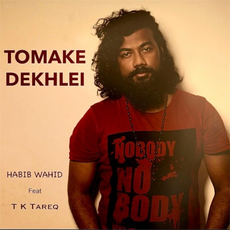 Tomake Dekhlei ft. T K Tareq | Boomplay Music