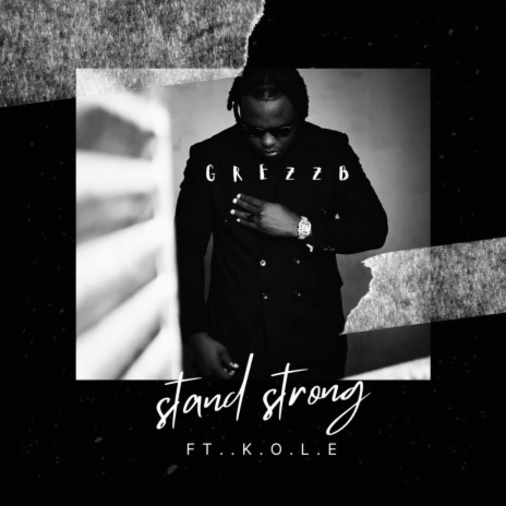 Stand Strong ft. Kole | Boomplay Music