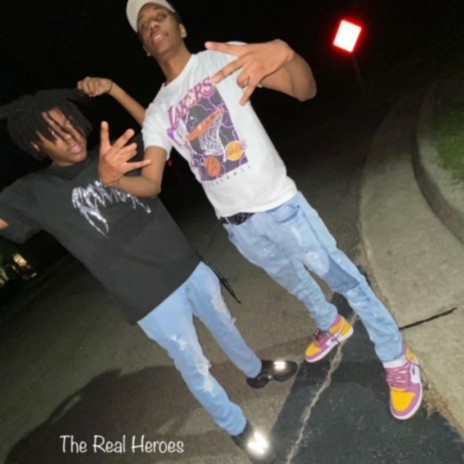 The Real Heroes ft. Rohi.Rackss | Boomplay Music