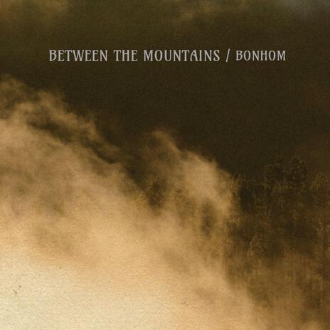 Between The Mountains | Boomplay Music