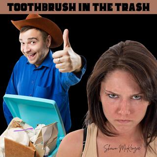 Toothbrush in the trash