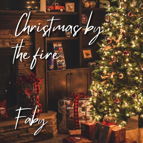 Christmas by the fire | Boomplay Music