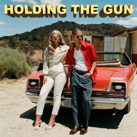 Holding the Gun | Boomplay Music